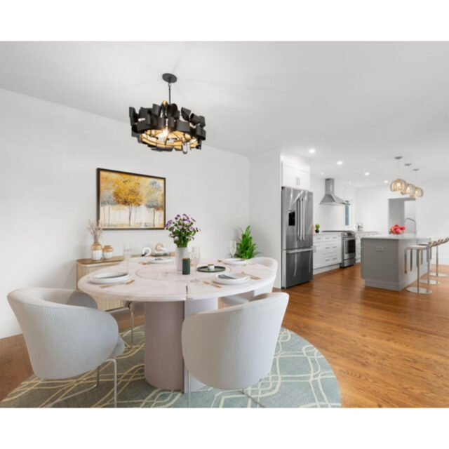 At this location in Newburyport, MA, the open kitchen is defined by a long central island and warm wood flooring that carries throughout the home. Globe pendant lighting adds softness above, while the upper level brings in natural light through skylights, creating a calm, airy retreat. Each detail works together to create a home that feels both modern and timeless. 

 #AnySeasonDesignBuild #NewburyportMA #HomeRenovation #BuiltWithPurpose #AiryInteriors #ElevatedLiving